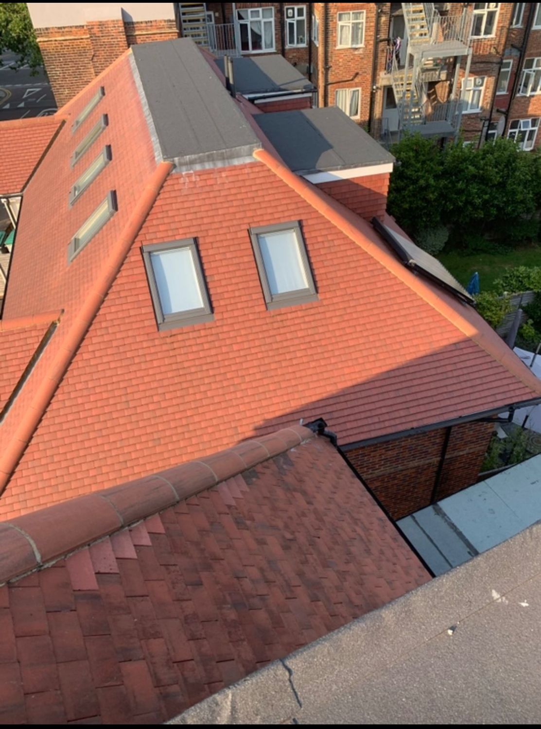 Red tiled roof with two new skylights
